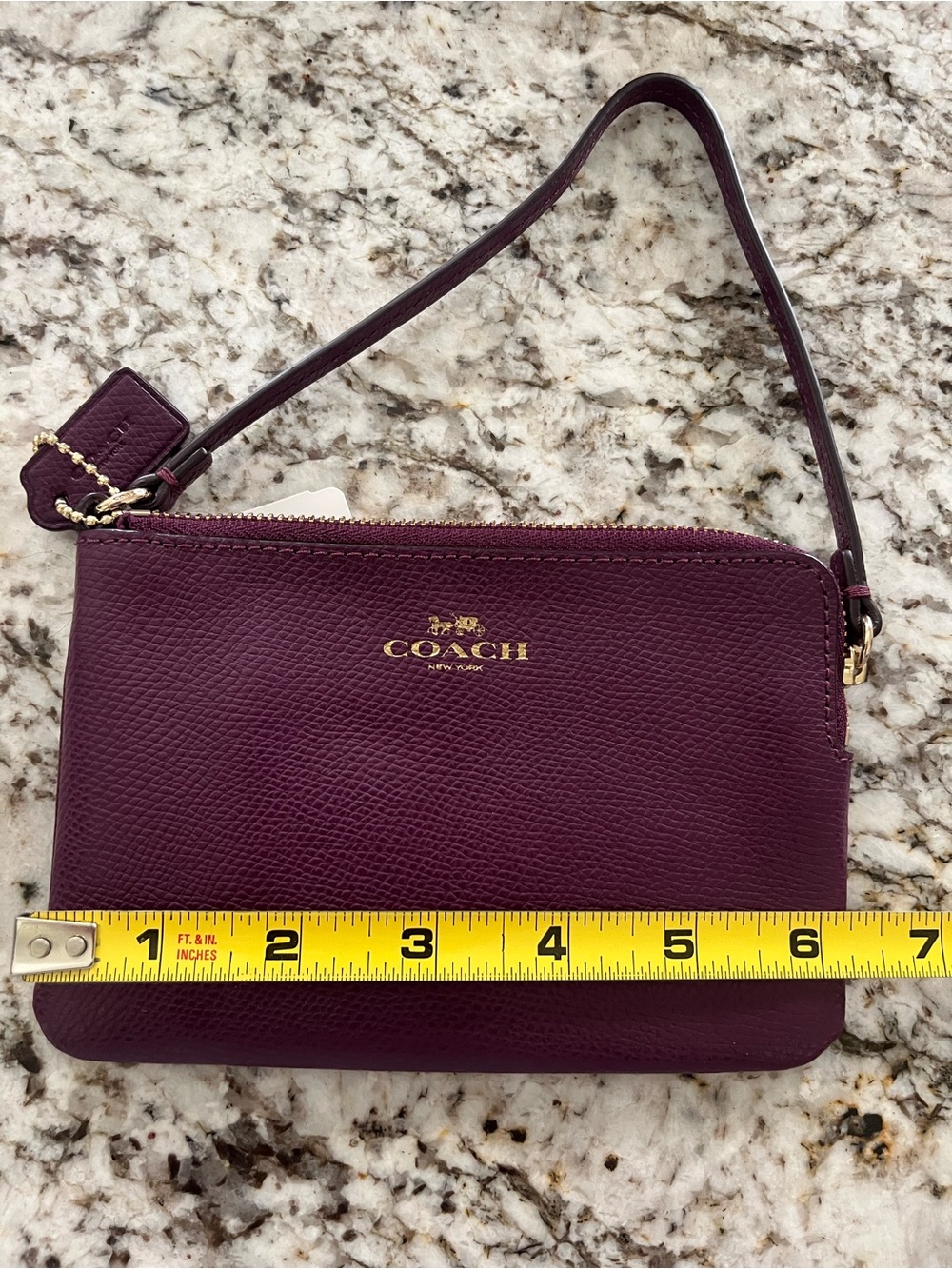 COACH Plum Purple Leather Wristlet with Gold Logo